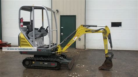 how to start a wacker neuson mini excavator|wacker neuson 1404 mini excavator.